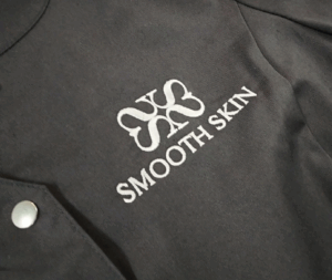broderie, création de logo à Roanne pour Smooth Skin, épilation définitive à Roanne. Agence de communication à Roanne